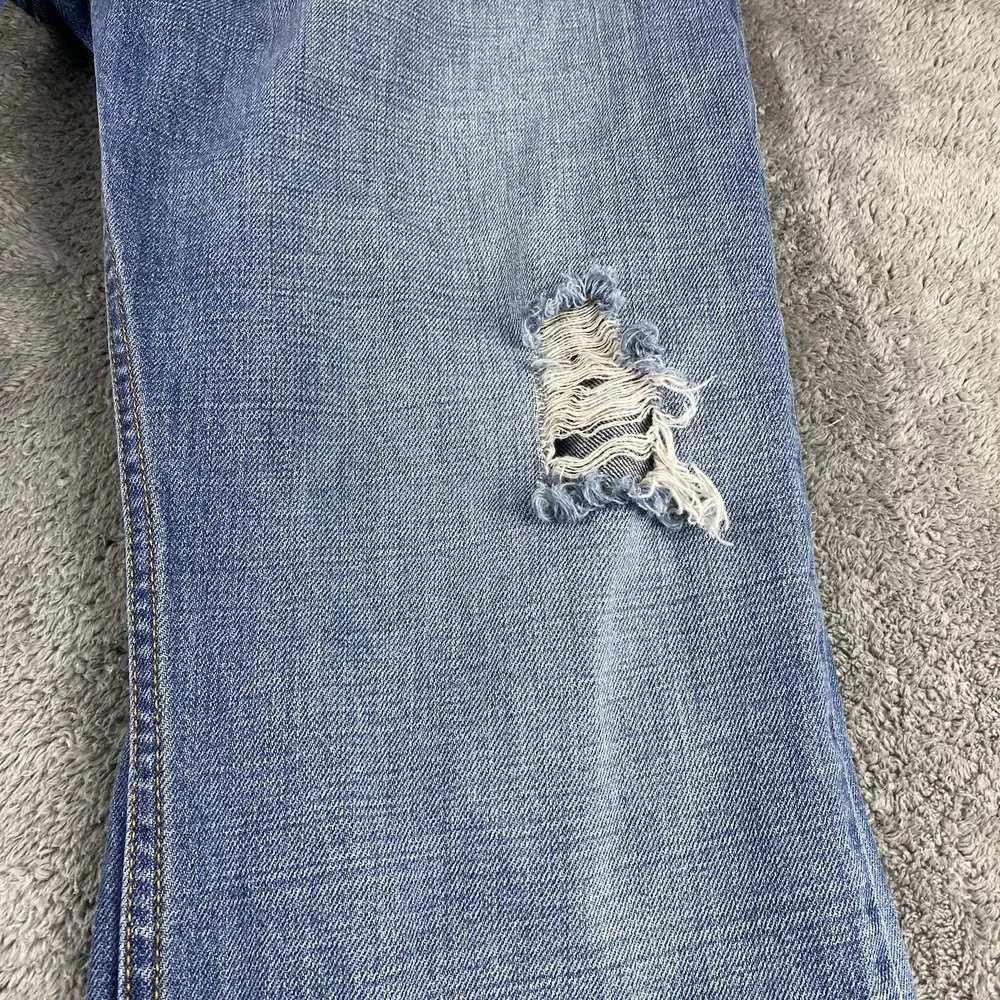 Levis 527 Low Boot Cut Jeans Mens 34x30 Blue Medium Wash Mid Rise Distressed Rip